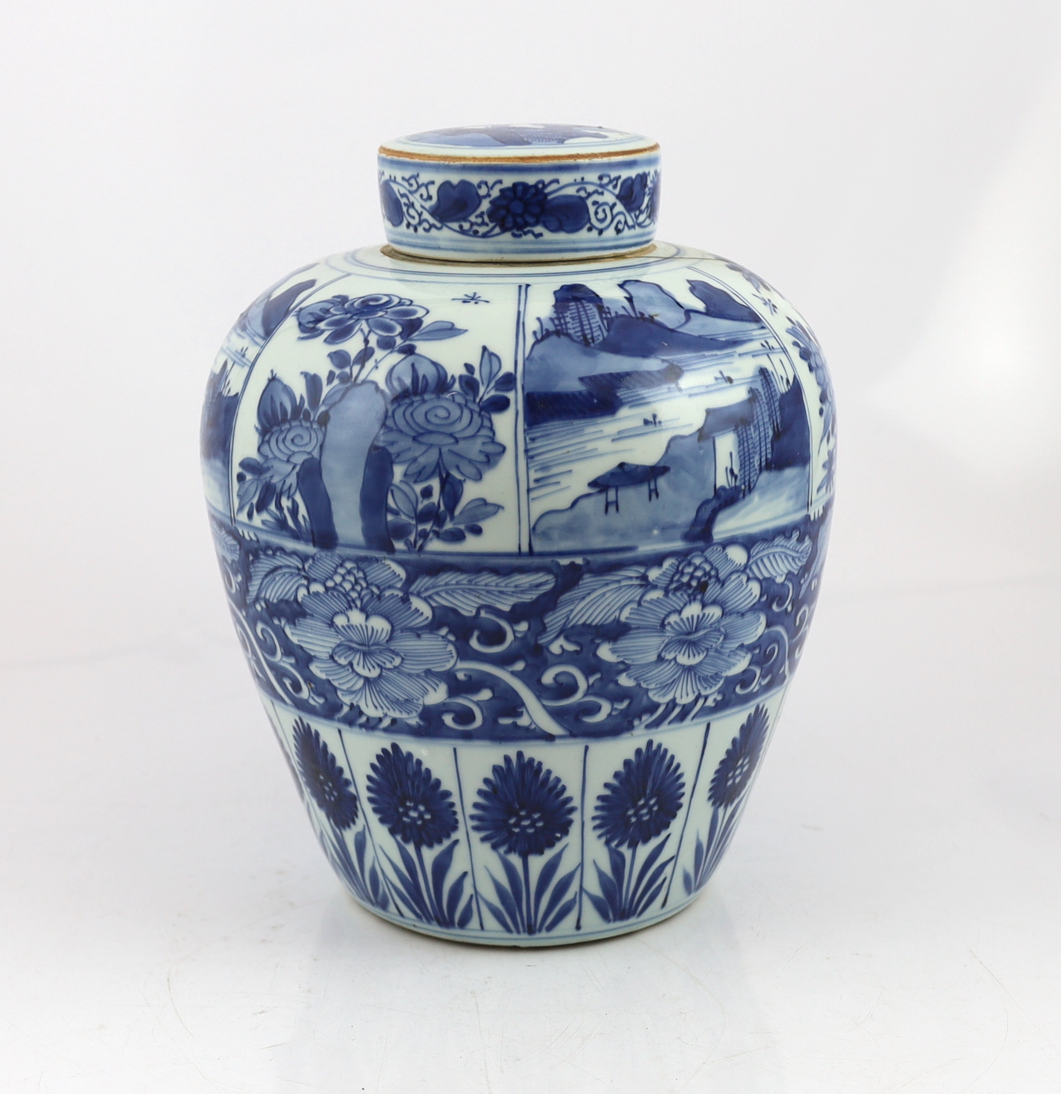 A Chinese blue and white ovoid jar and cover, Kangxi period, broken with kintsugi repair